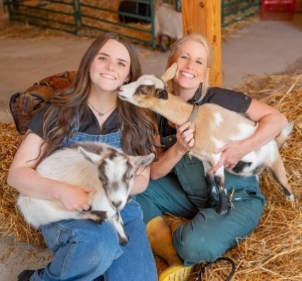 Women with goats